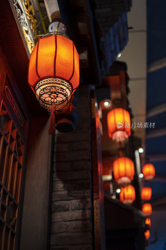 Red lanterns hanging in an ancient Asian town